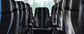 leather seats in a luxury charter bus